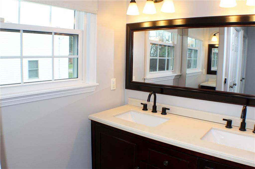 9462 Peebles Road Allison Park, PA 15101 - Photo 35 of 50 a bathroom with a sink and a mirror