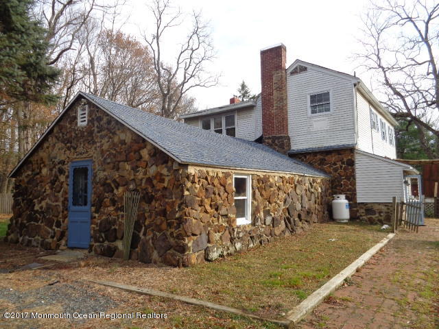 90 Jackson Mills Road Freehold, NJ 07728 - Photo 1 of 18 a view of a house with a yard