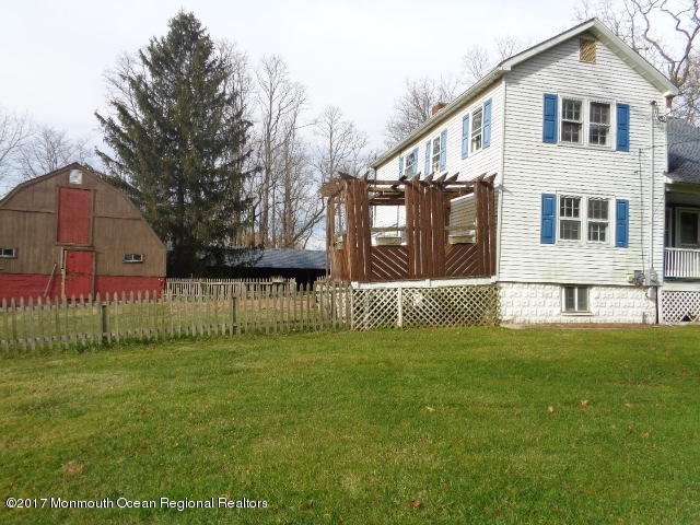 90 Jackson Mills Road Freehold, NJ 07728 - Photo 18 of 18 a view of a house with a yard