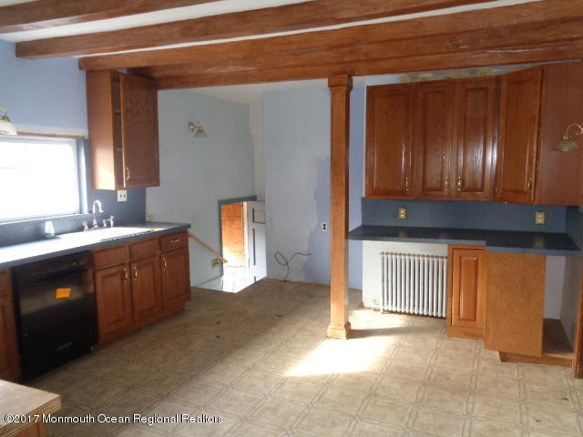 90 Jackson Mills Road Freehold, NJ 07728 - Photo 3 of 18 a spacious bathroom with a sink and a mirror