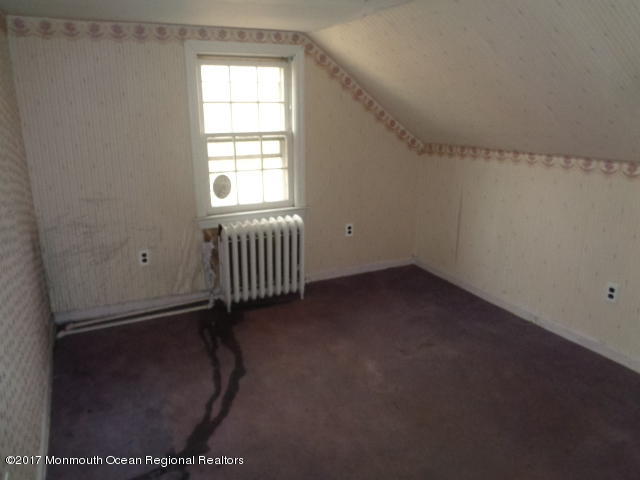 90 Jackson Mills Road Freehold, NJ 07728 - Photo 10 of 18 an empty room with windows