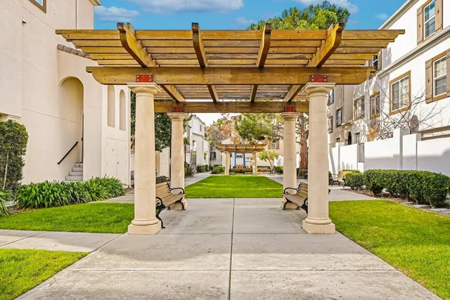 a view of a building with a yard