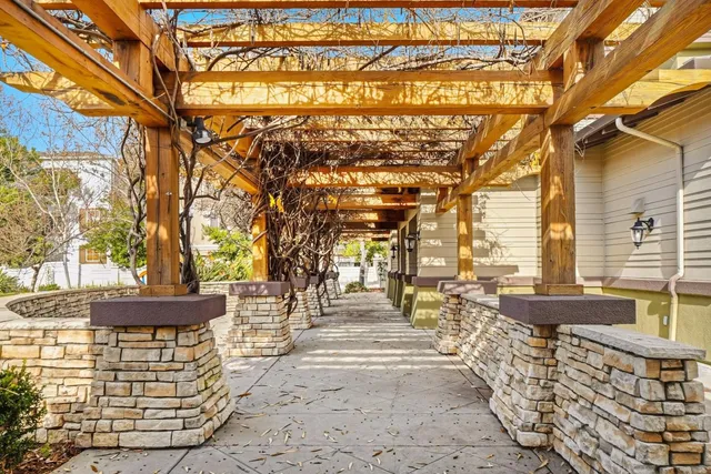 a view of swimming pool with outdoor seating