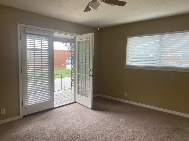 a view of balcony with wooden floor and outdoor space