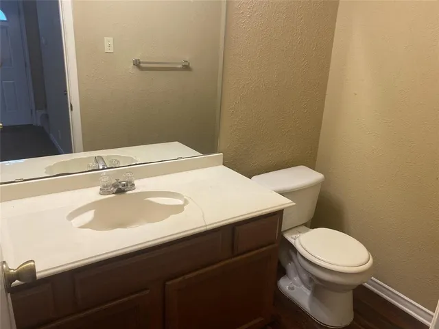 a bathroom with a sink and a toilet