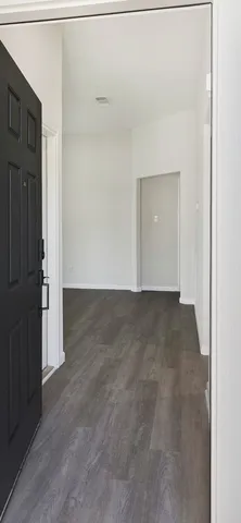 a kitchen with stainless steel appliances granite countertop a stove sink and cabinets