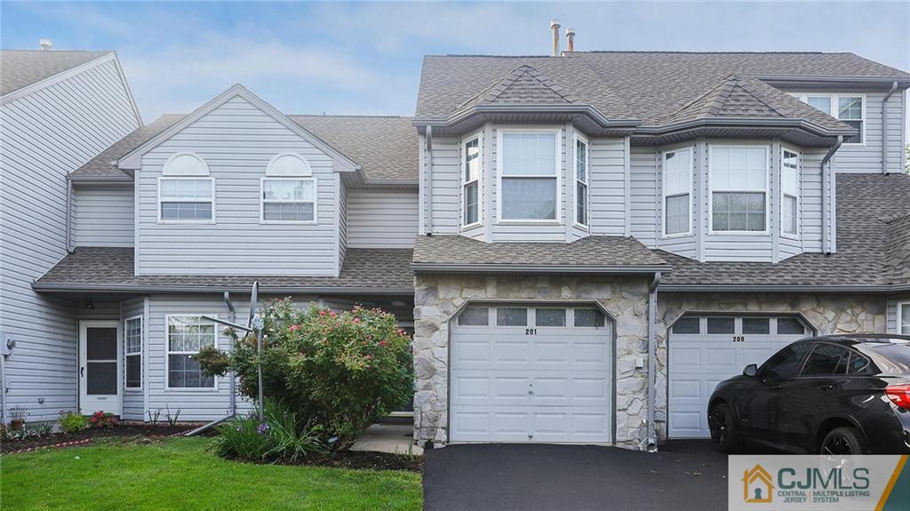 201 Nebula Road Piscataway, NJ 08854 - Photo 1 of 27 a front view of a house with a garden