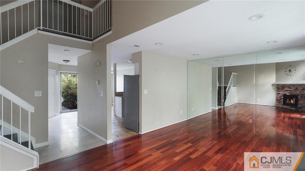 201 Nebula Road Piscataway, NJ 08854 - Photo 11 of 27 a view of empty room with wooden floor