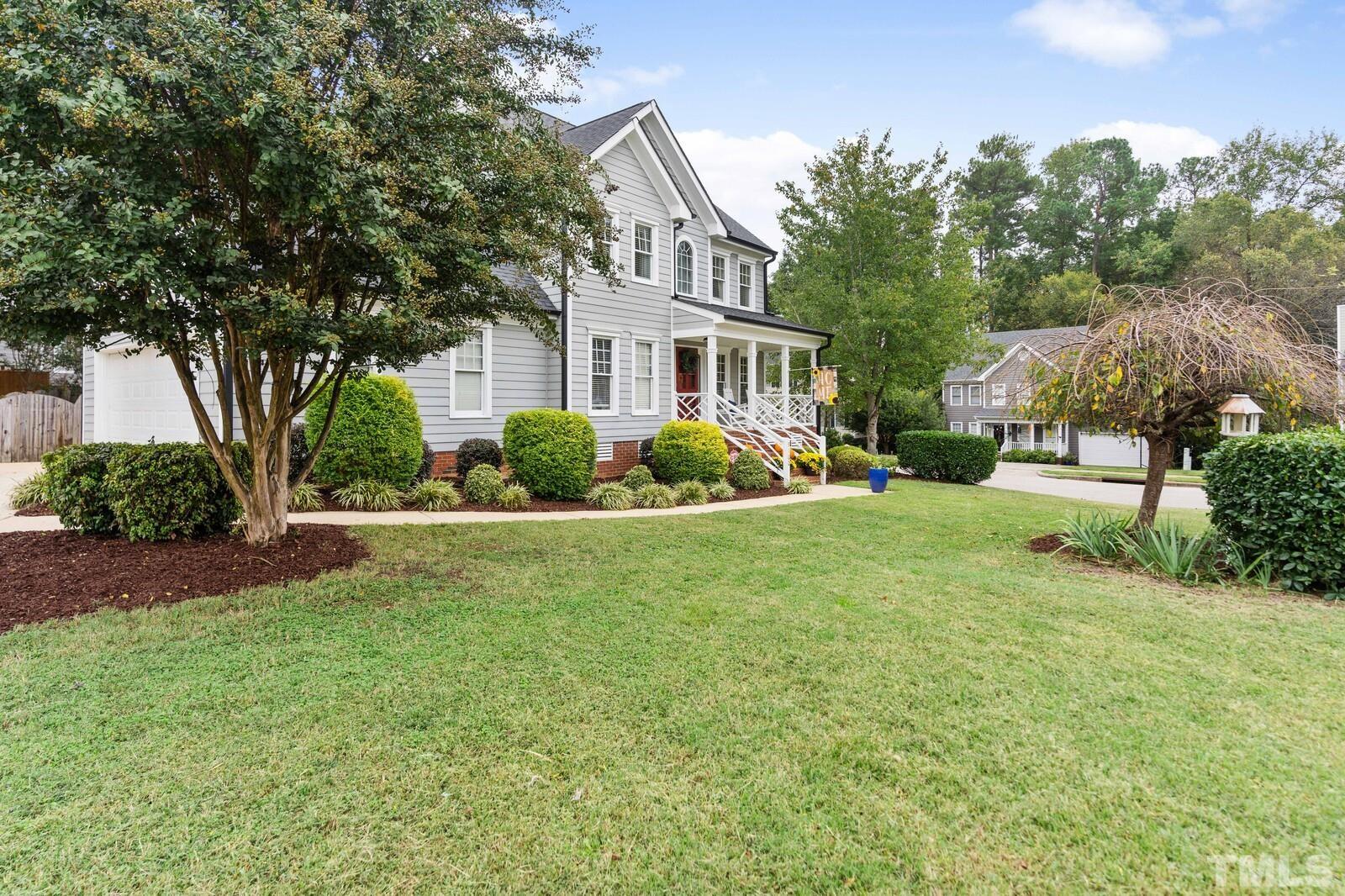 9100 Dawnshire Road Raleigh, NC 27615 - Photo 3 of 30 a front view of house with yard and green space