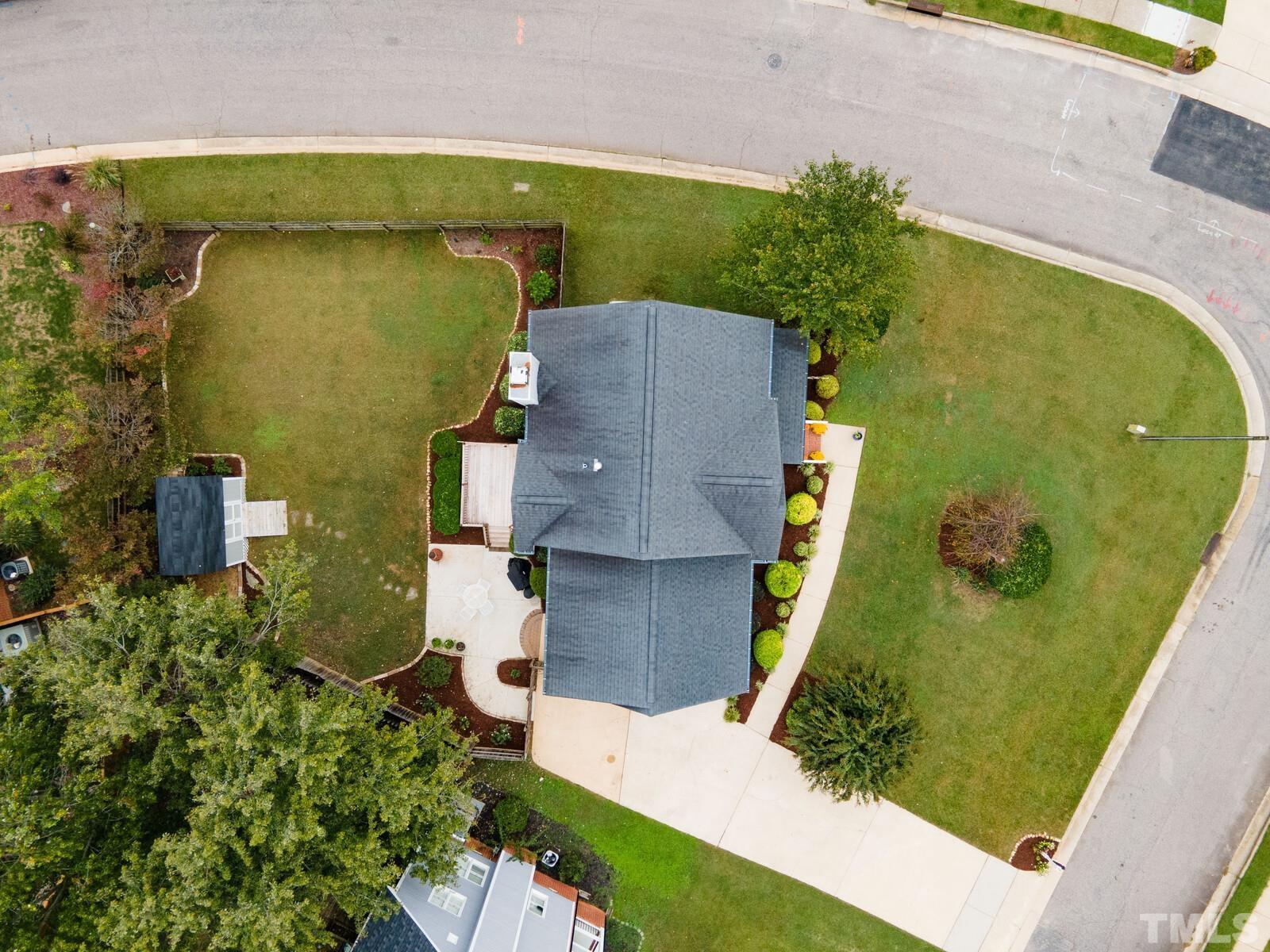 9100 Dawnshire Road Raleigh, NC 27615 - Photo 30 of 30 an aerial view of a house with a yard