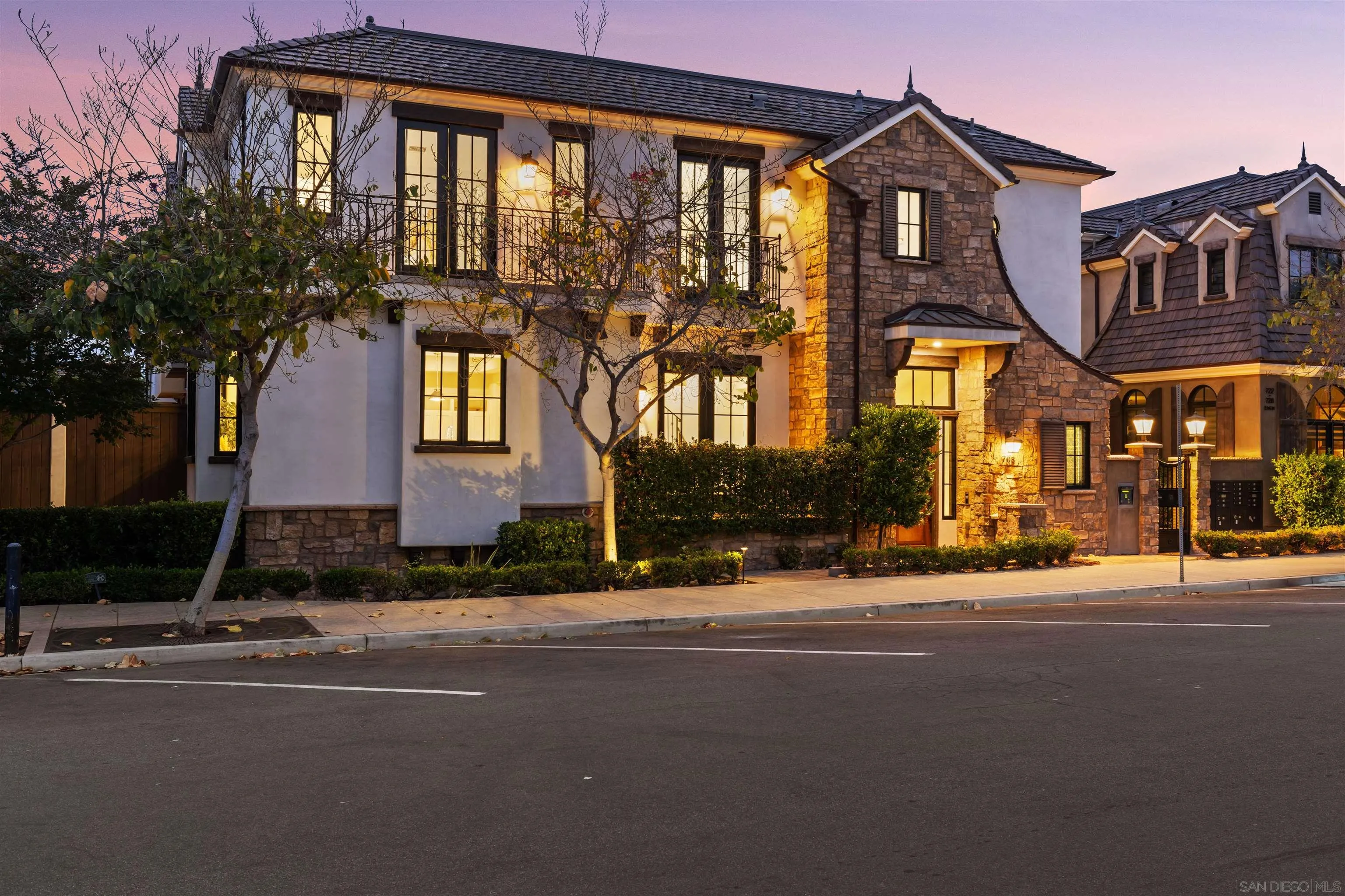 a front view of a building with street view