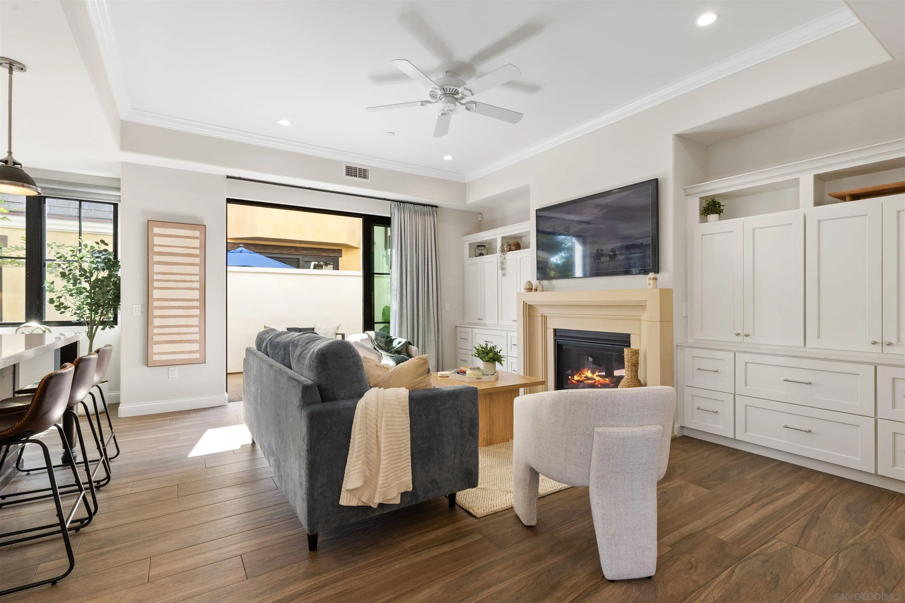 708 Silver Street La Jolla, CA 92037 - Photo 12 of 44 a living room with fireplace furniture and a wooden floor