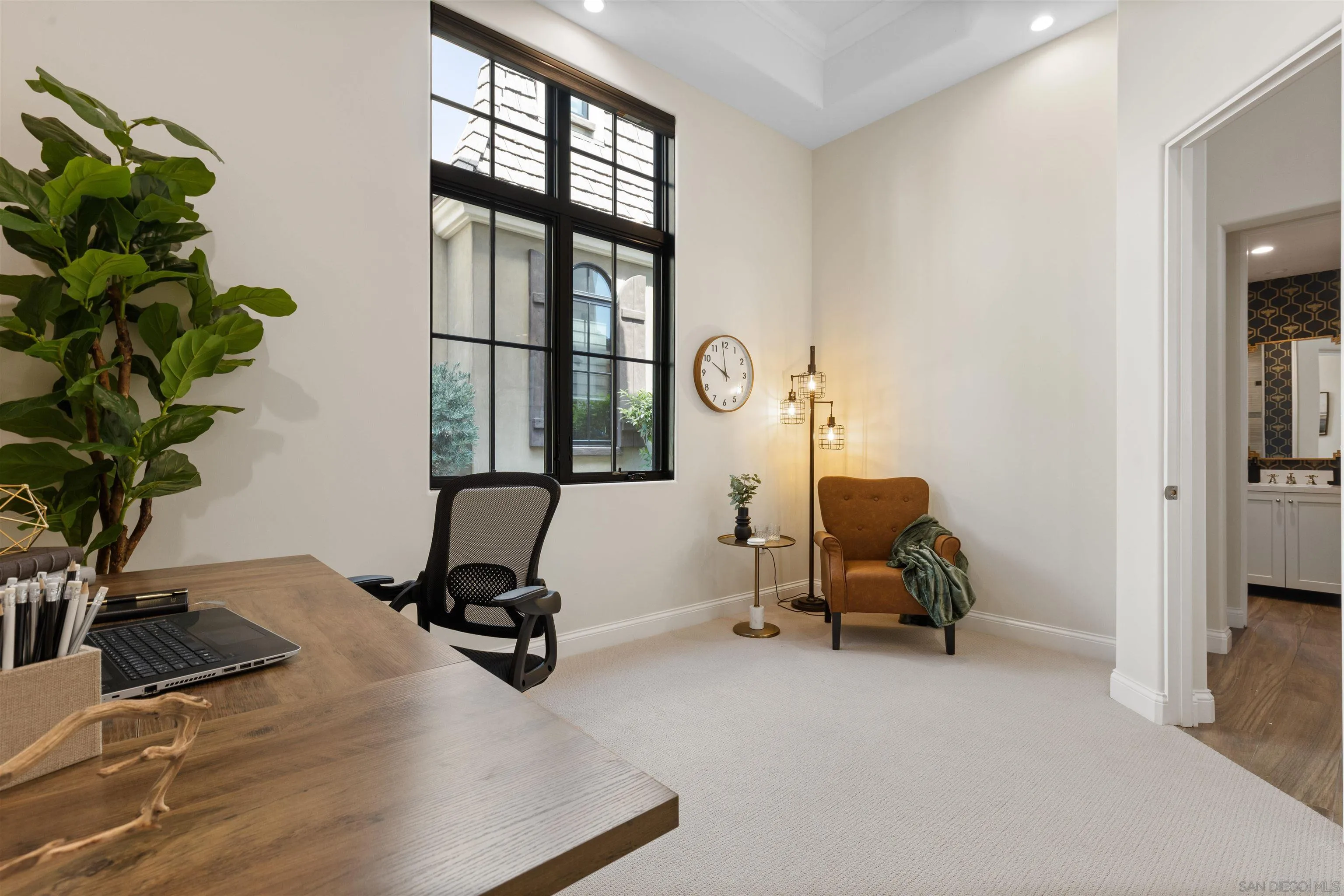 708 Silver Street La Jolla, CA 92037 - Photo 21 of 44 a view of a workspace with furniture and a window