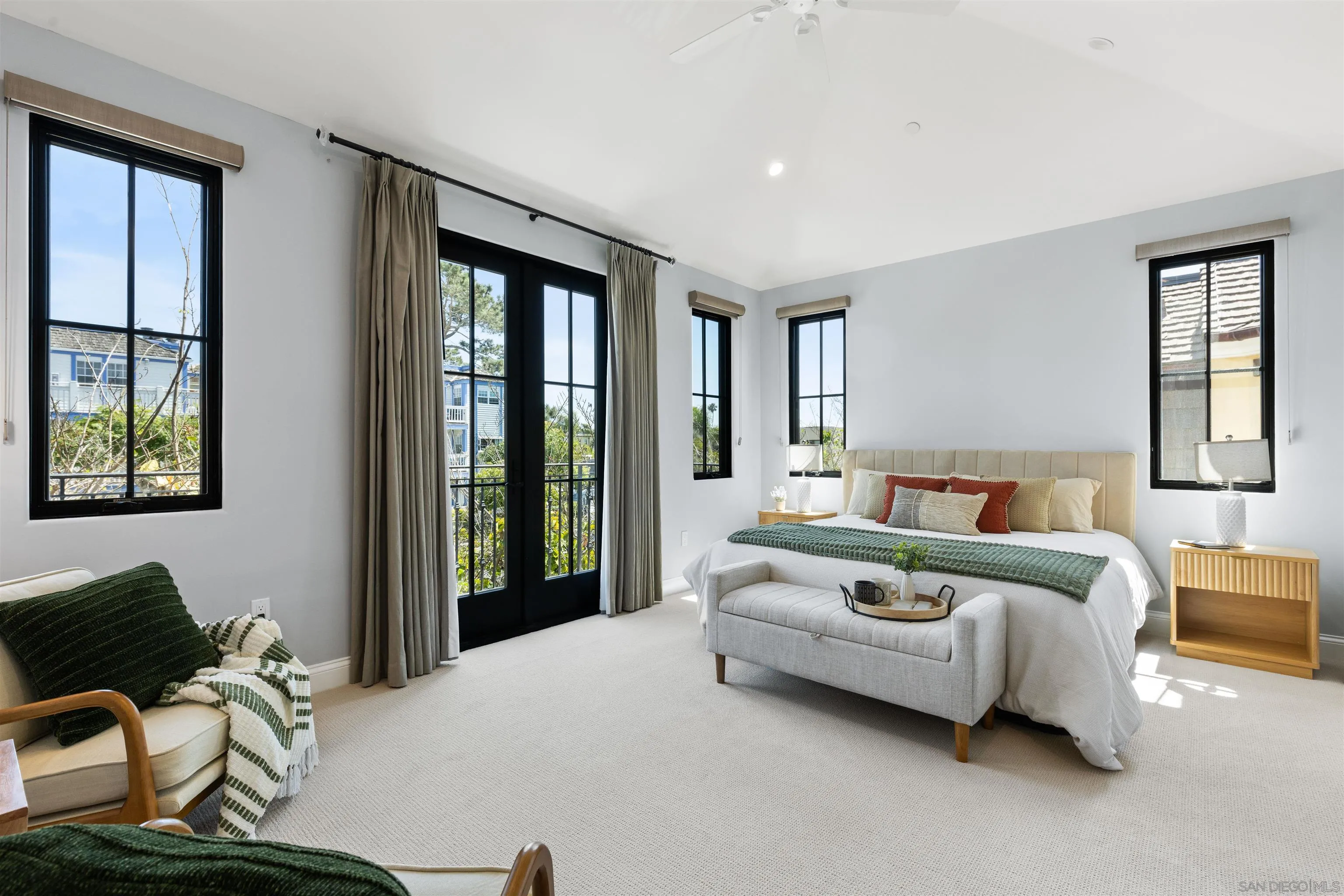 708 Silver Street La Jolla, CA 92037 - Photo 24 of 44 a living room with furniture and a large window