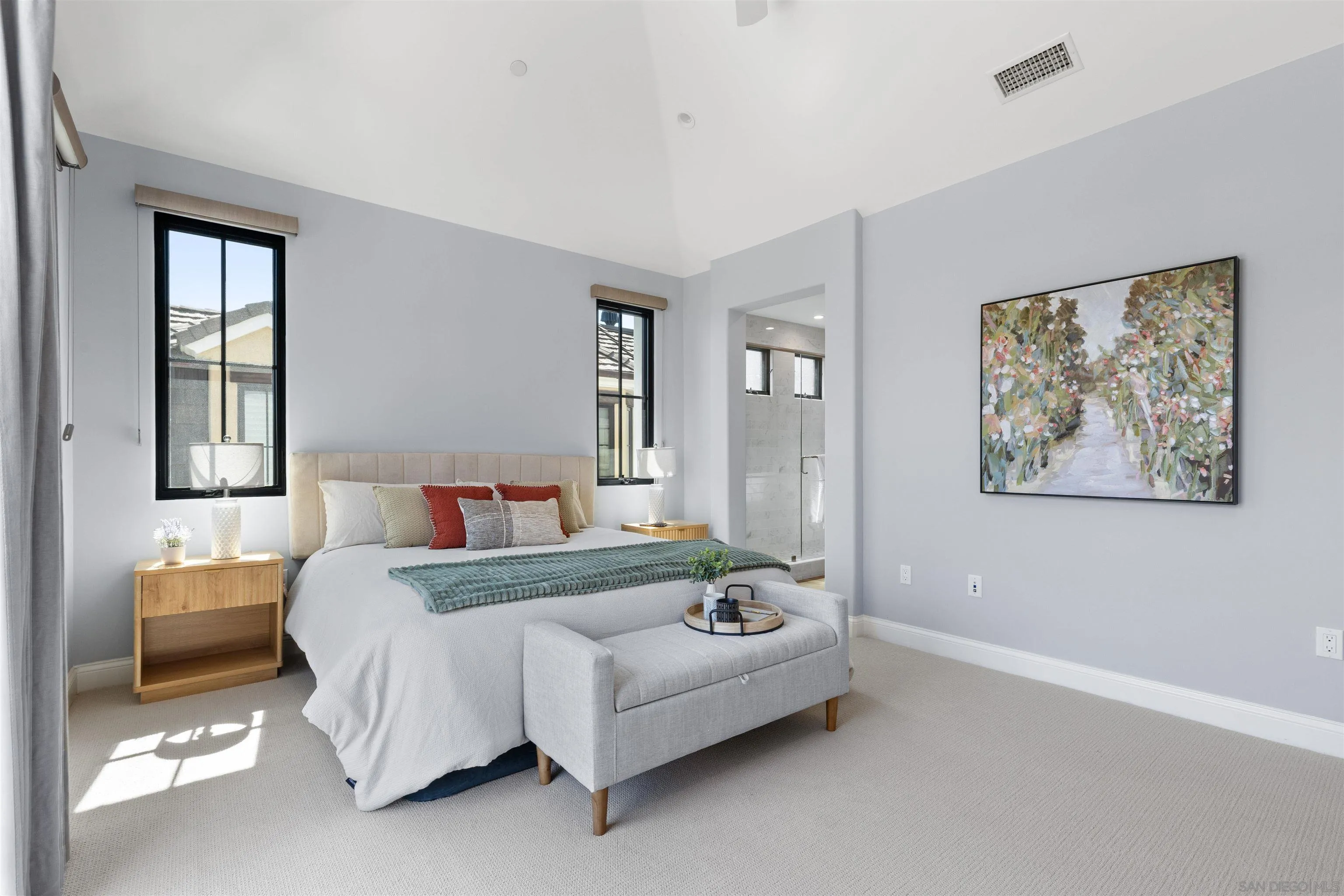 708 Silver Street La Jolla, CA 92037 - Photo 26 of 44 a bedroom with a bed and a painting on the wall