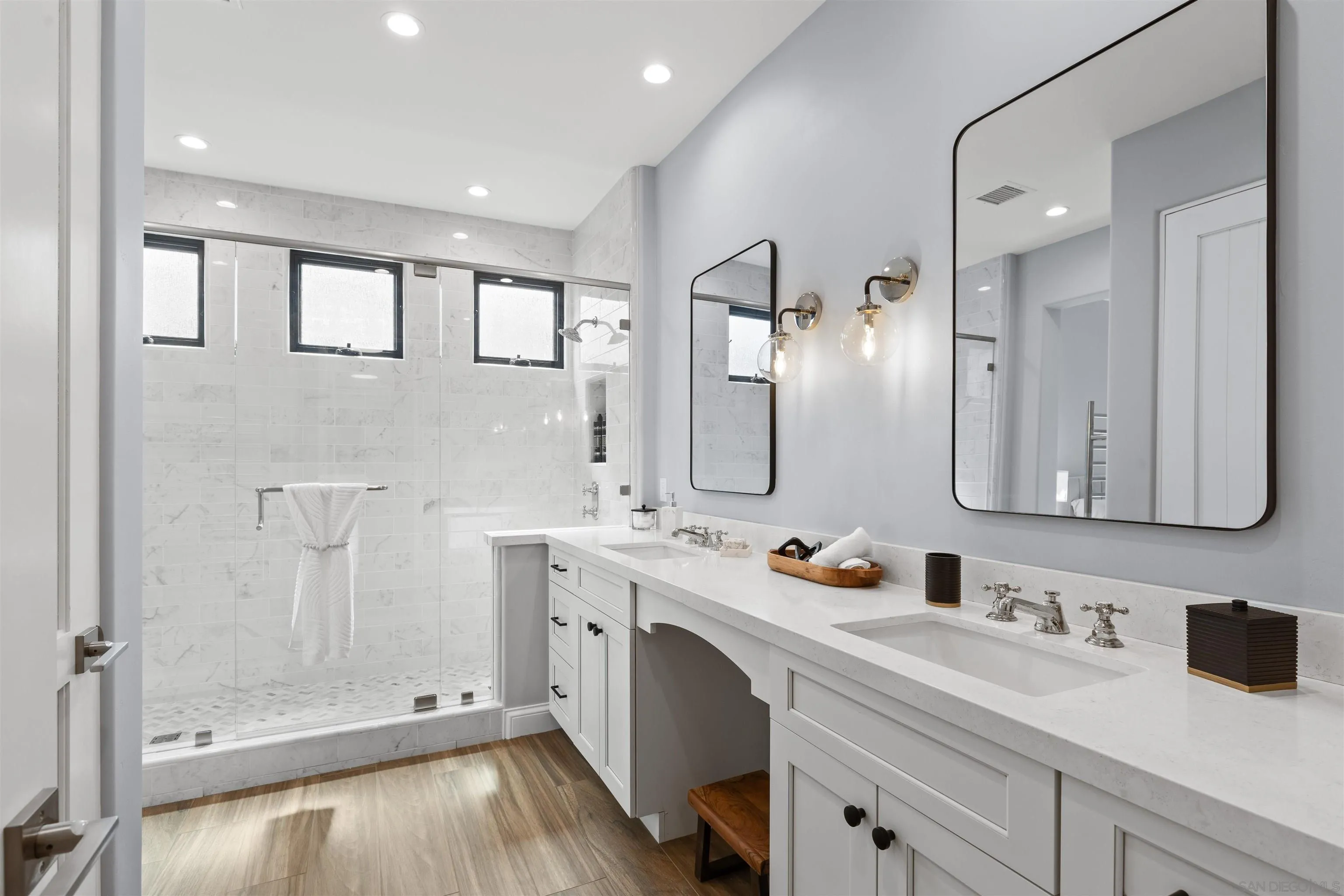 708 Silver Street La Jolla, CA 92037 - Photo 29 of 44 a bathroom with a double vanity sink mirror and shower