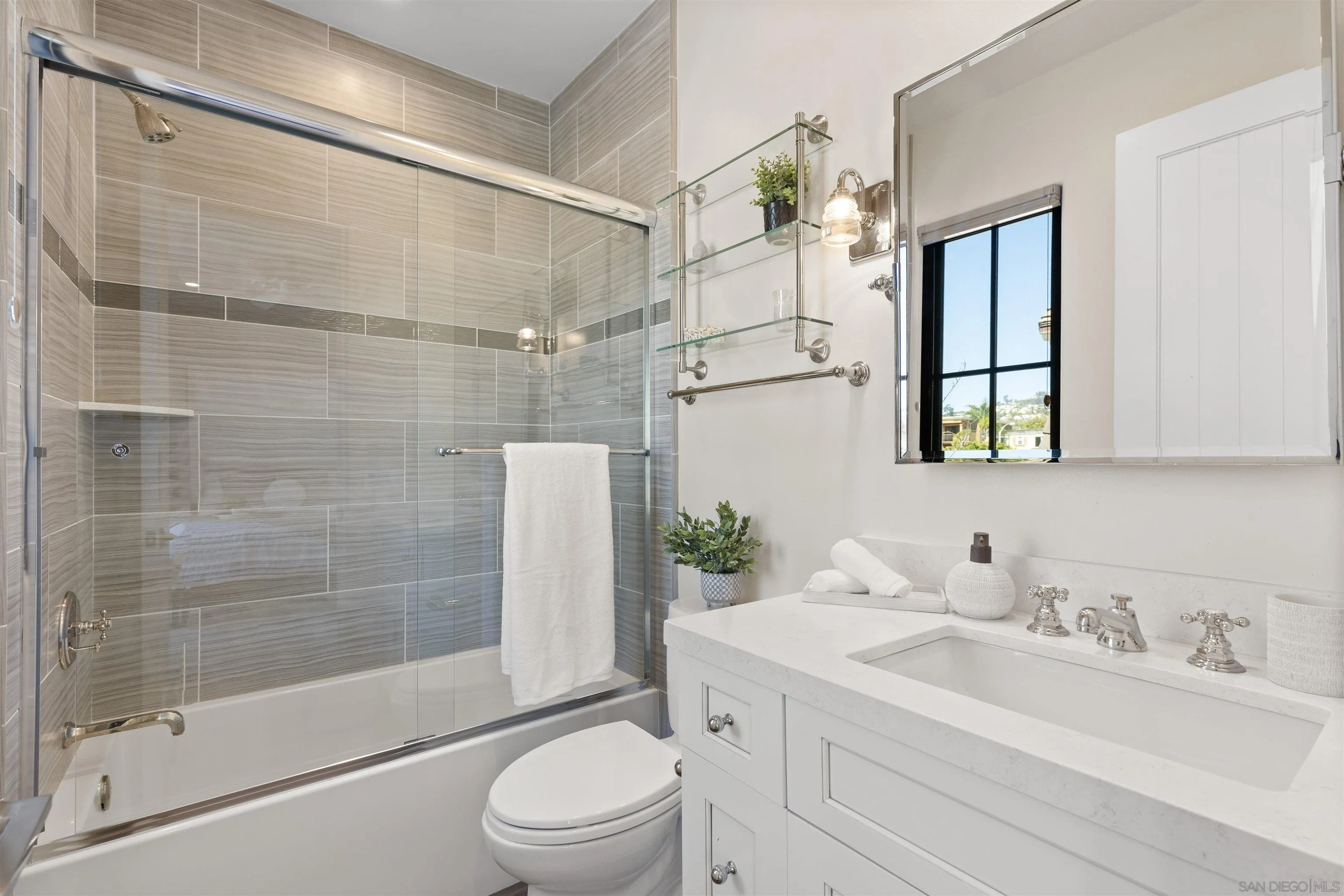 708 Silver Street La Jolla, CA 92037 - Photo 33 of 44 a bathroom with a sink a toilet and shower