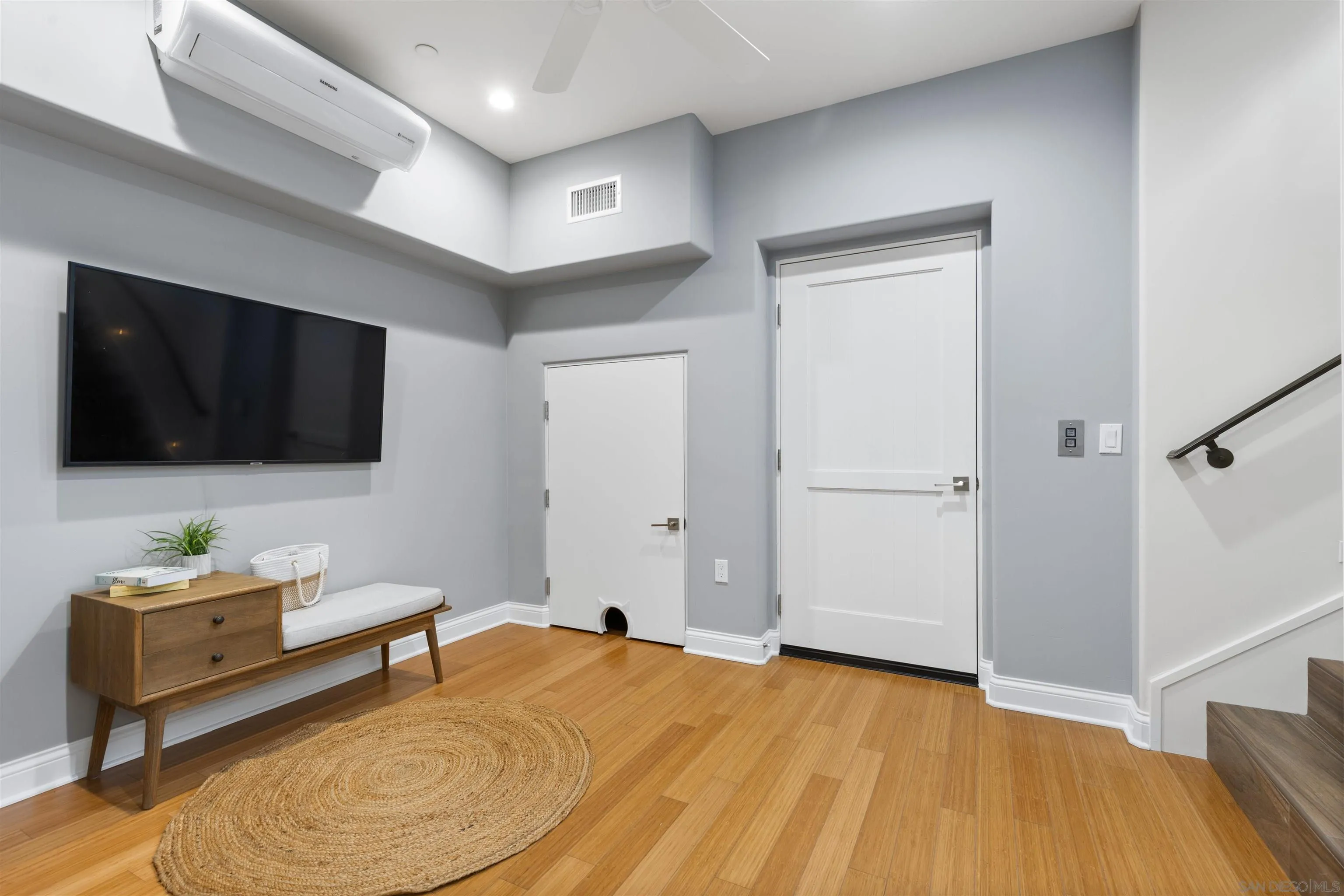 708 Silver Street La Jolla, CA 92037 - Photo 40 of 44 a bedroom with a bed and a flat screen tv