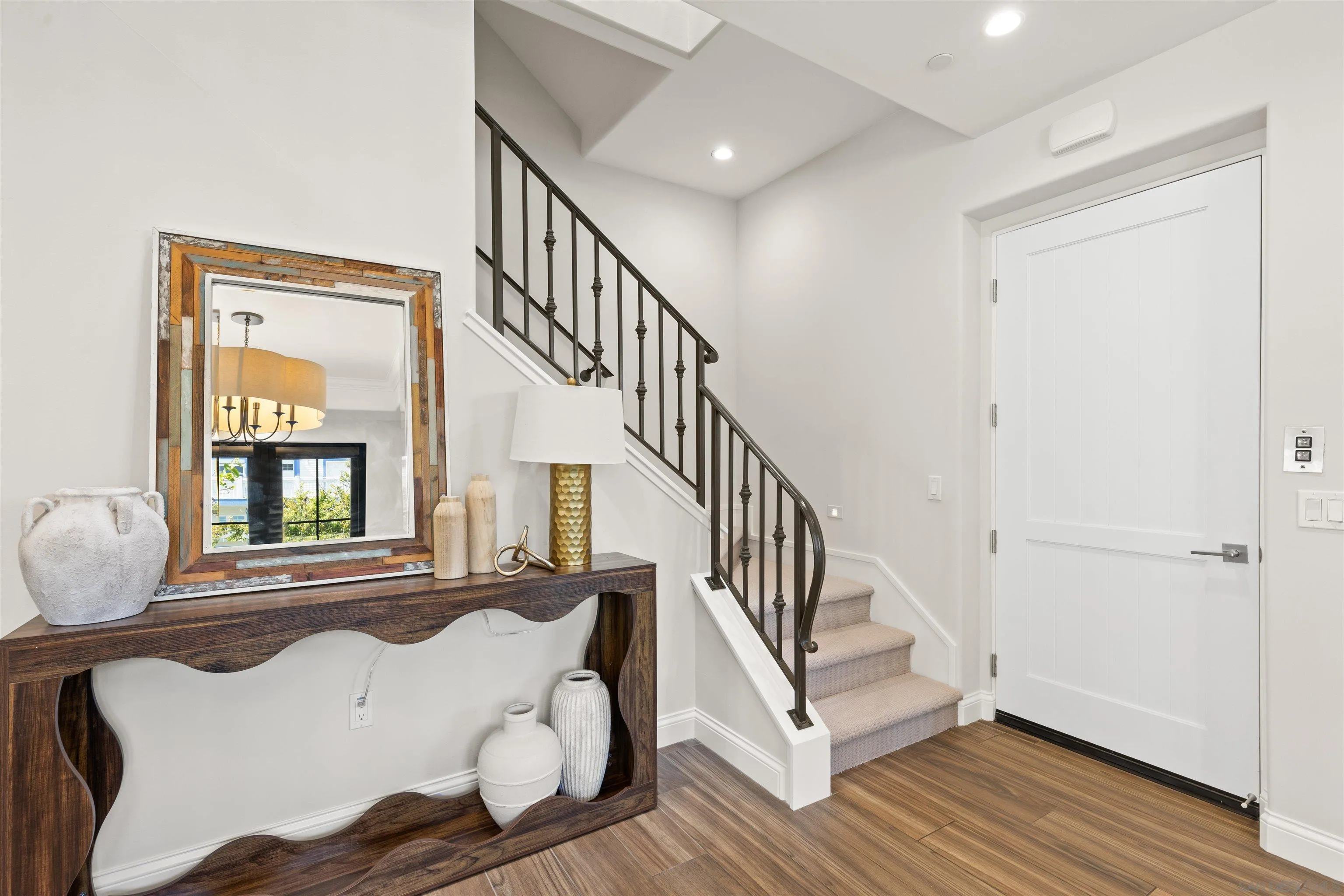 708 Silver Street La Jolla, CA 92037 - Photo 8 of 44 a bedroom with wooden floor and a window