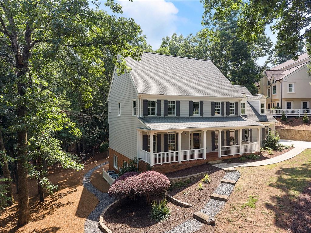 8965 Laurel Way Alpharetta, GA 30022 - Photo 61 of 79 a view of a big yard in front of a house