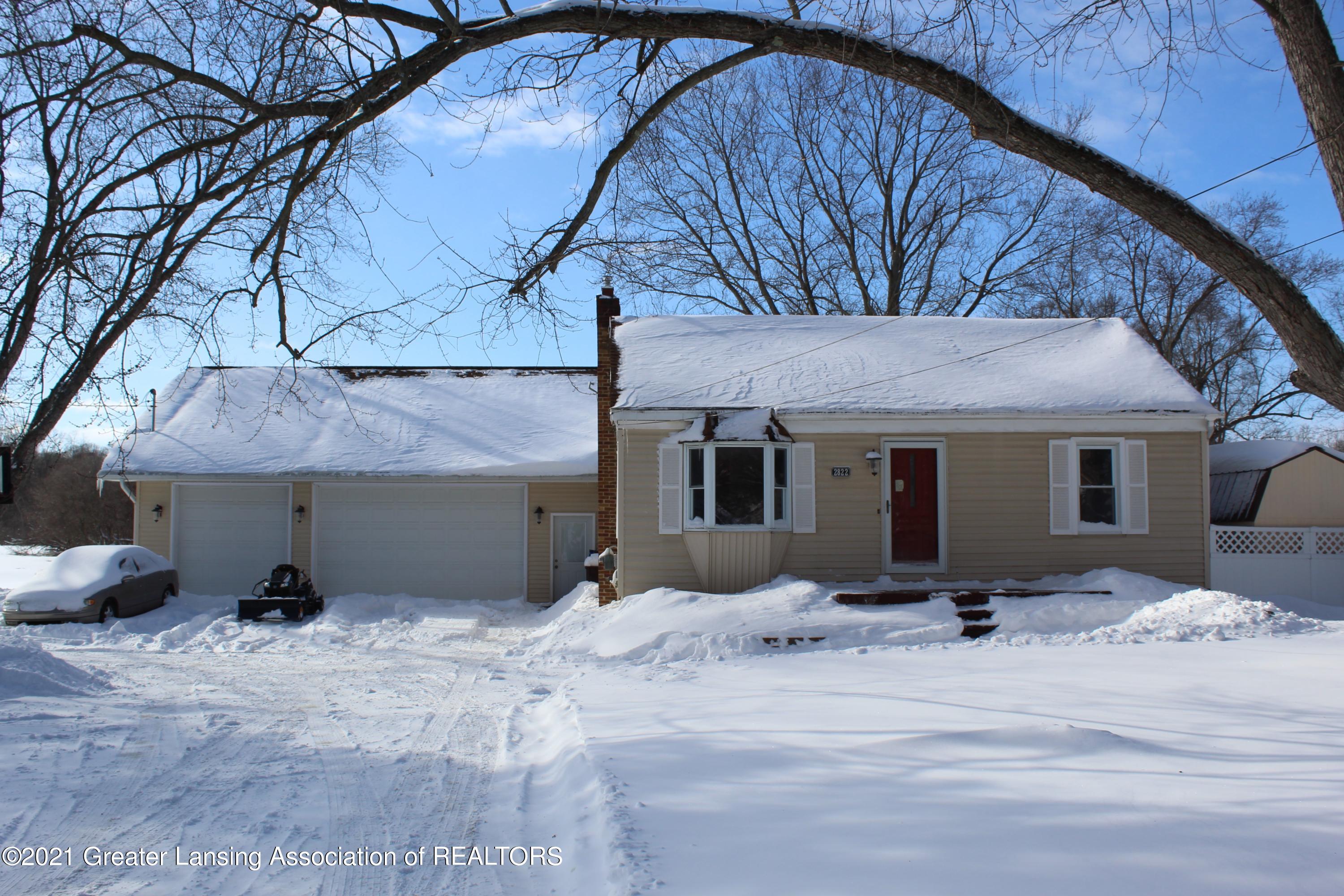 2822 North Aurelius Road Lansing, MI 48910 - Photo 1 of 50 1 - Front