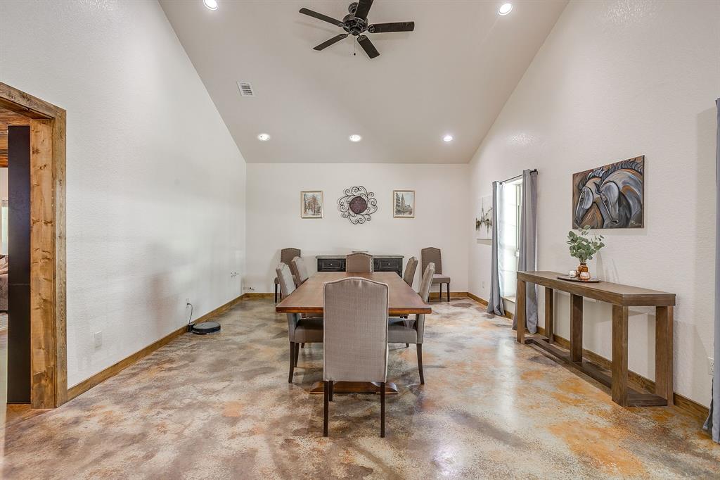 201 Curry Road Waxahachie, TX 75167 - Photo 13 of 40 a view of a dining room with furniture