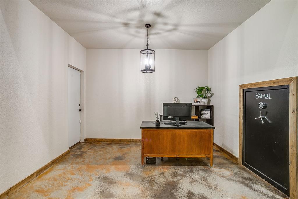 201 Curry Road Waxahachie, TX 75167 - Photo 15 of 40 a room with storage and utility