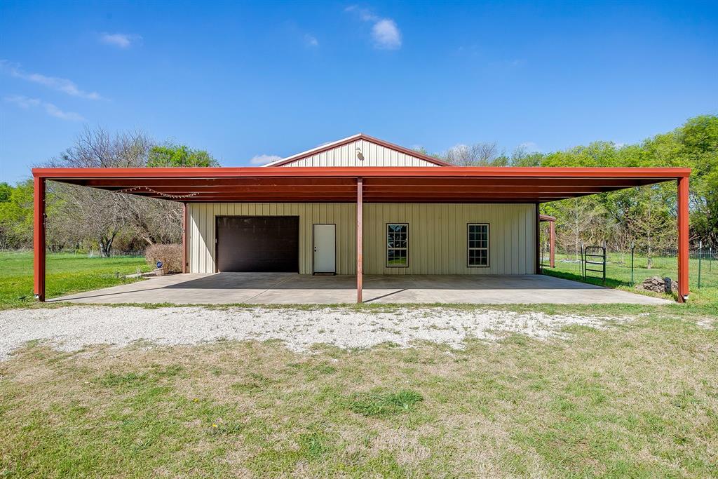 201 Curry Road Waxahachie, TX 75167 - Photo 28 of 40 a view of a house with a yard and floor