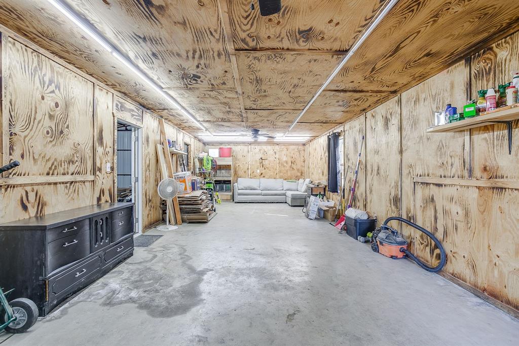 201 Curry Road Waxahachie, TX 75167 - Photo 33 of 40 a view of parking garage with cars
