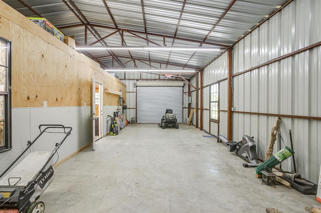 201 Curry Road Waxahachie, TX 75167 - Photo 34 of 40 a view of a room with gym equipment