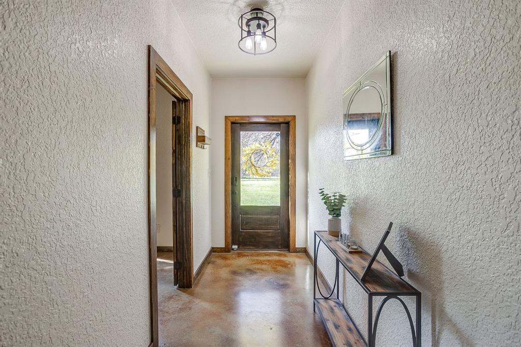 201 Curry Road Waxahachie, TX 75167 - Photo 4 of 40 a view of a livingroom with furniture and window