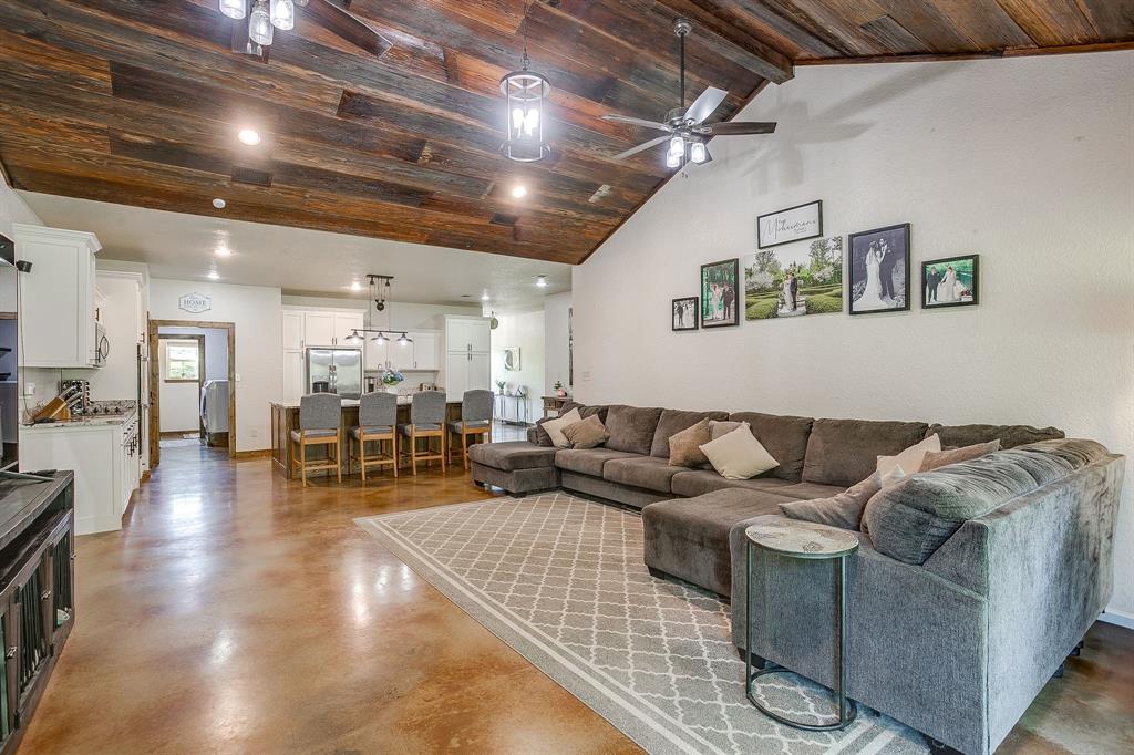 201 Curry Road Waxahachie, TX 75167 - Photo 8 of 40 a living room with furniture and wooden floors