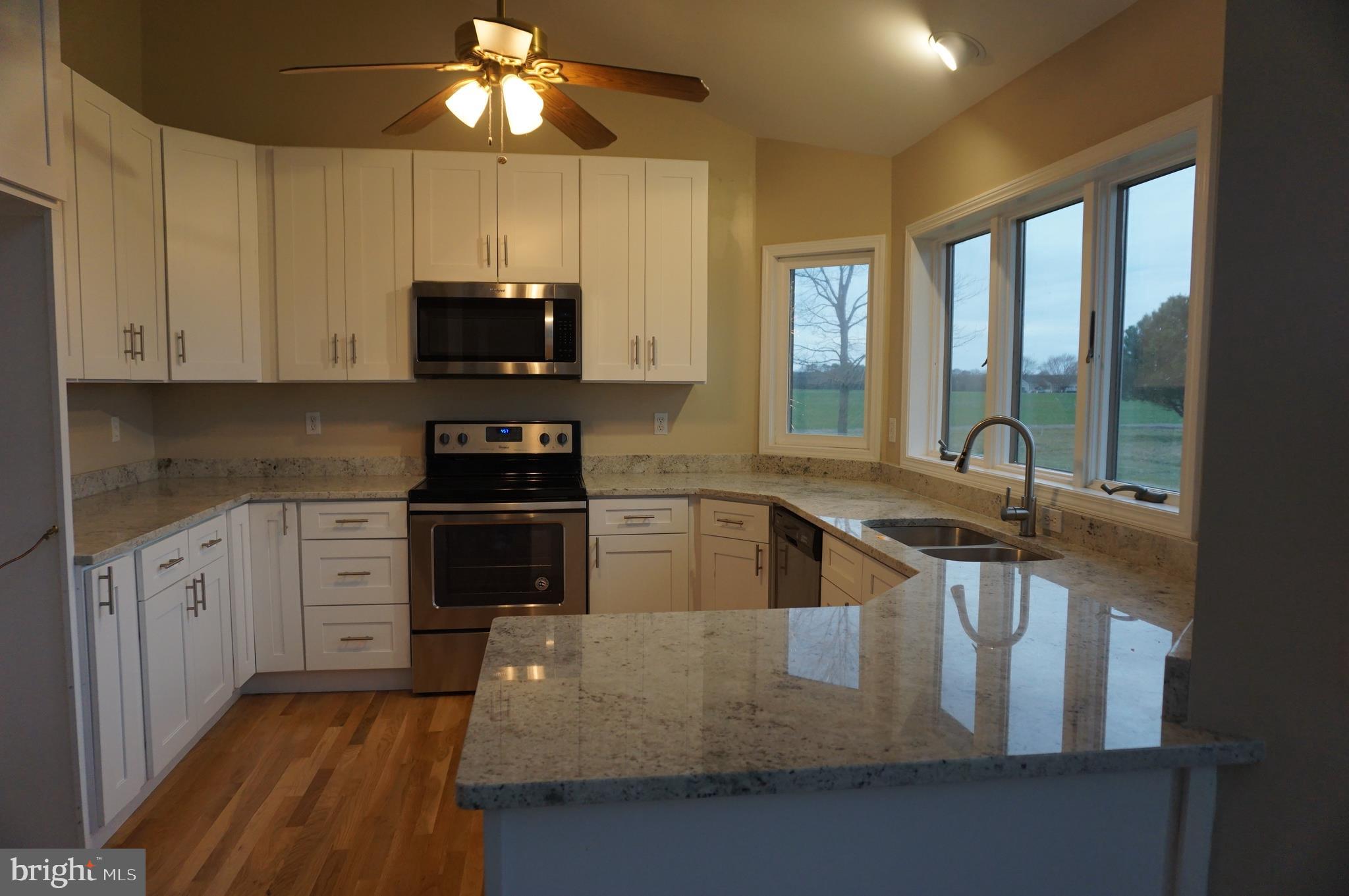 112 Conquest Road Centreville, MD 21617 - Photo 11 of 29 Kitchen with beautiful view of farmland