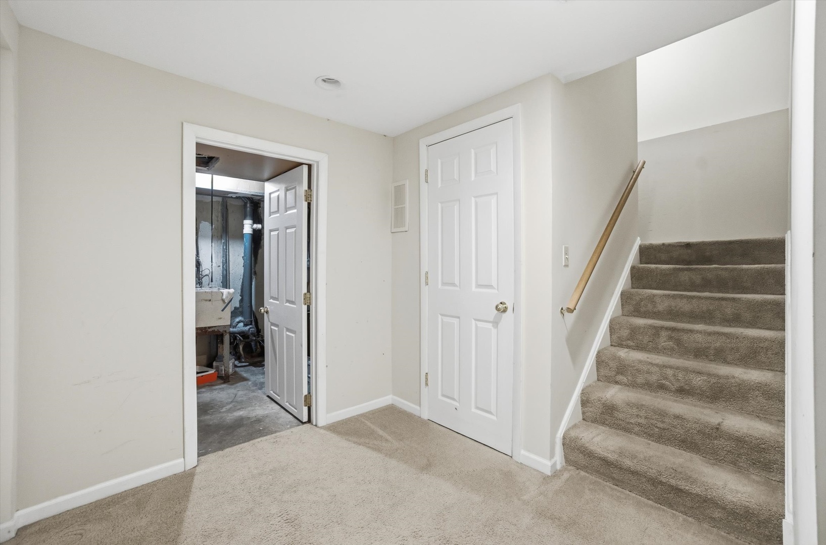 413 Buffalo Trail Wheeling, IL 60090 - Photo 18 of 29 a view of entryway with bedroom and stairs