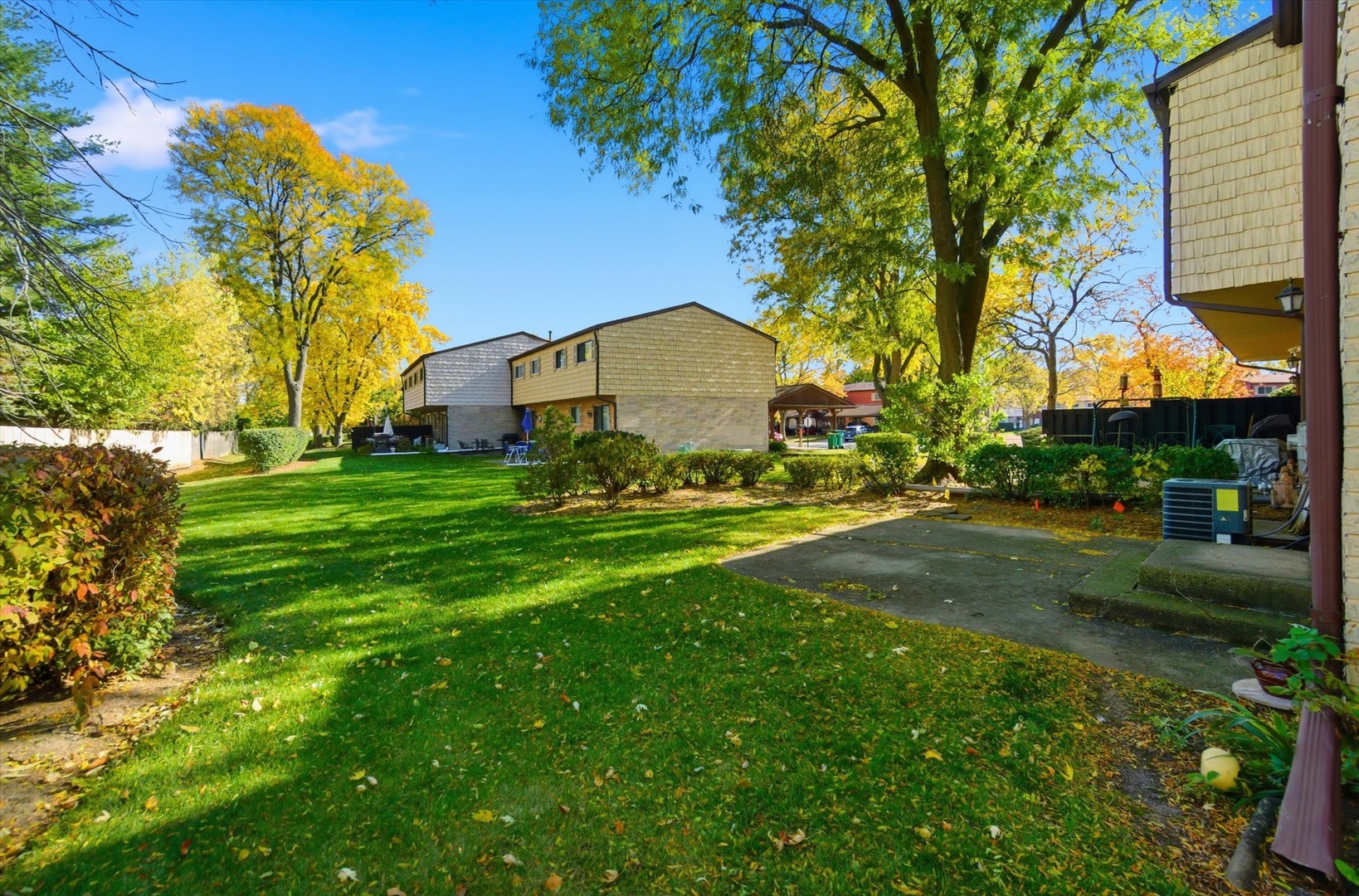 413 Buffalo Trail Wheeling, IL 60090 - Photo 24 of 29 a view of a house with a big yard and large trees