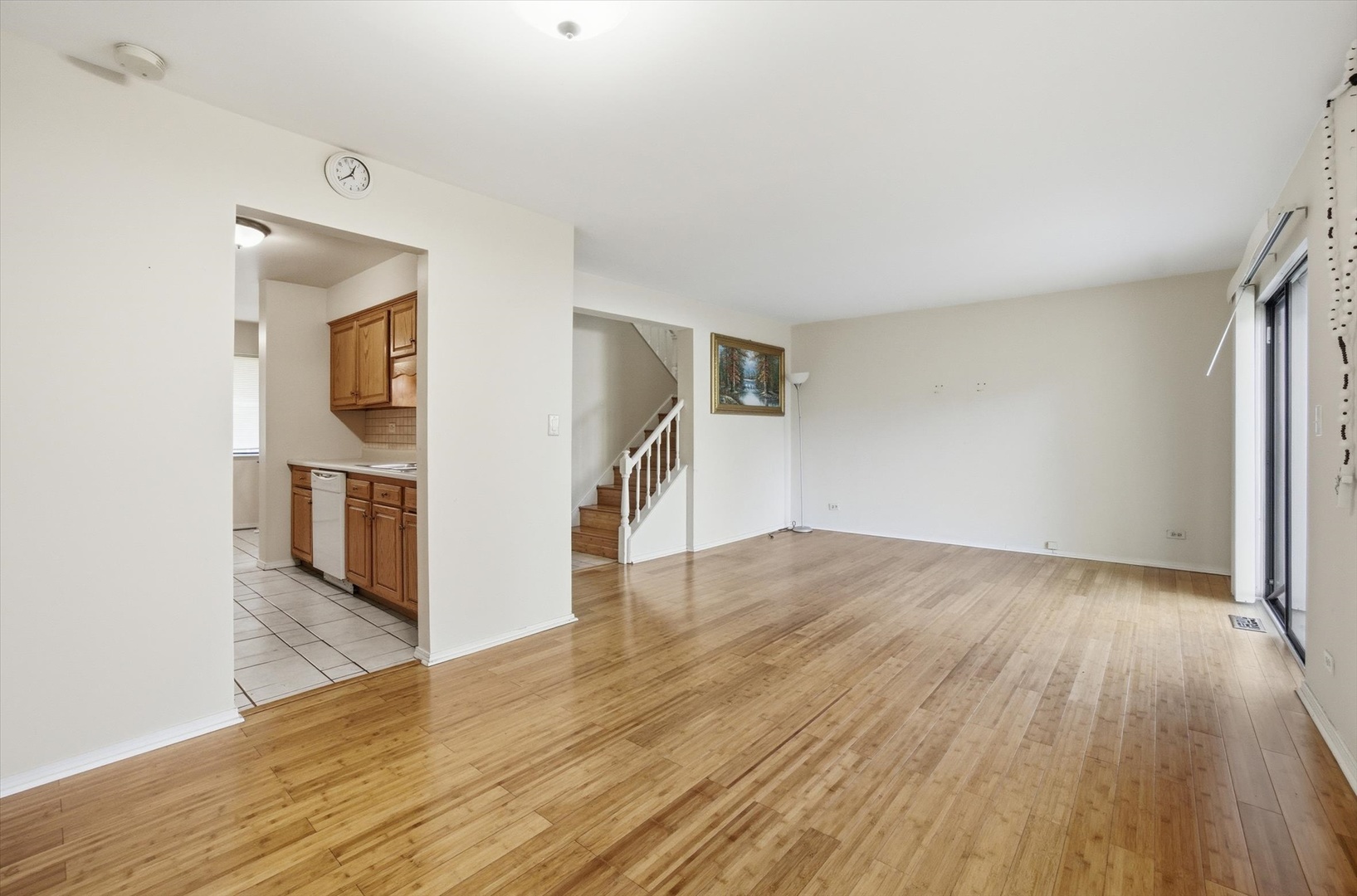 413 Buffalo Trail Wheeling, IL 60090 - Photo 8 of 29 a view of empty room with wooden floor