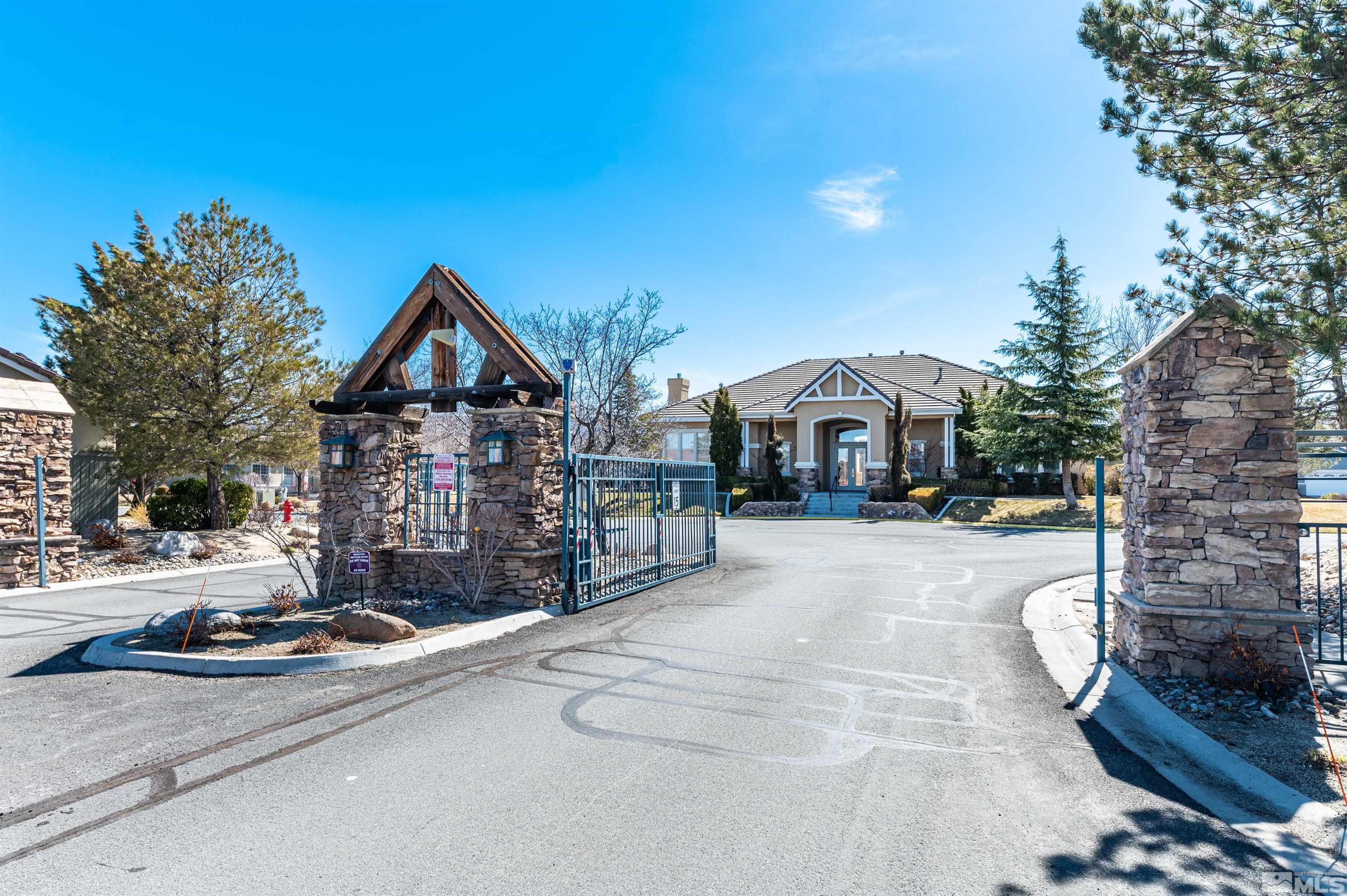 10472 Summershade Lane Reno, NV 89521 - Photo 3 of 30 a view of multiple houses with cars parked