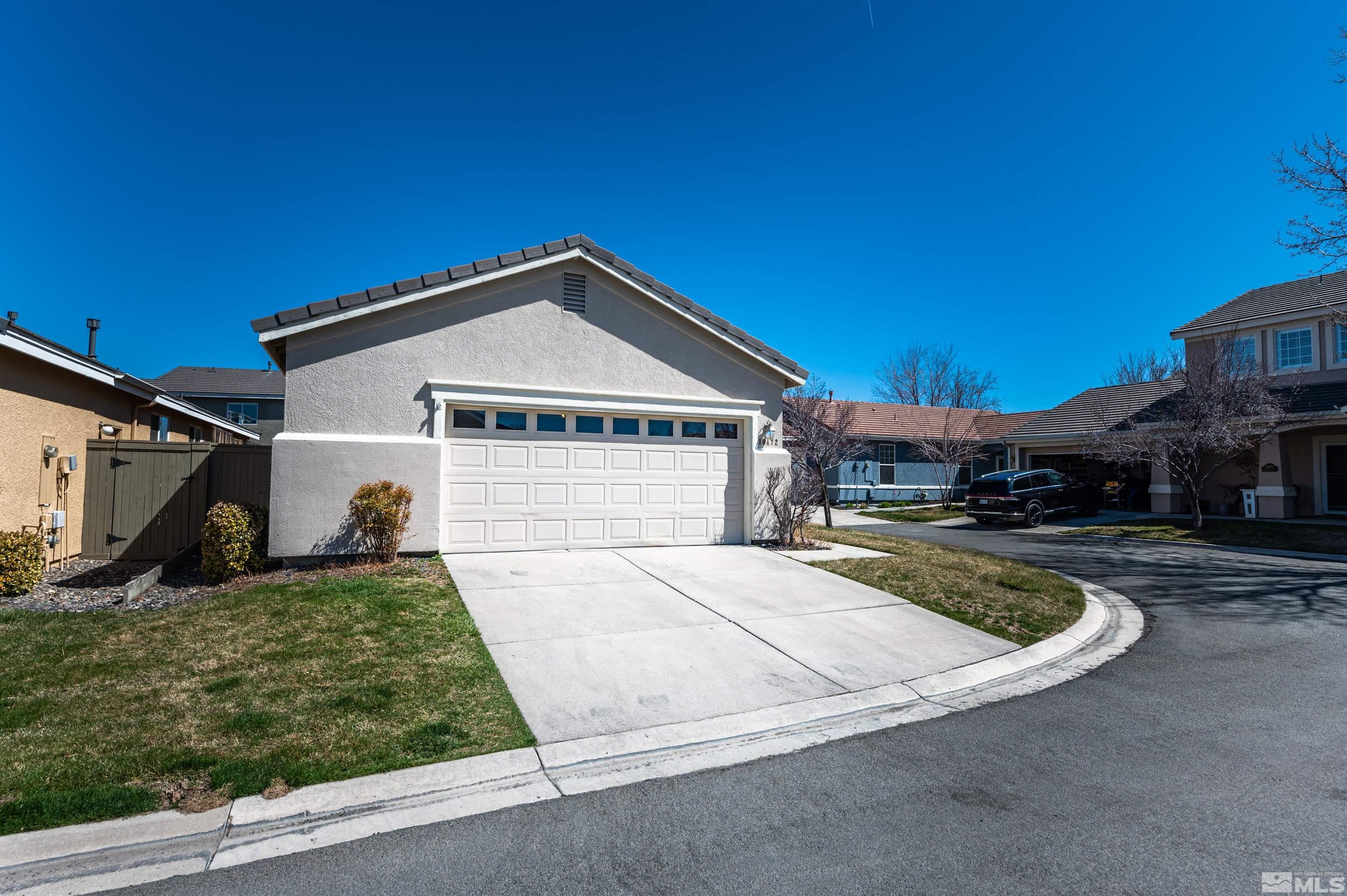 10472 Summershade Lane Reno, NV 89521 - Photo 8 of 30 a view of a house with a yard
