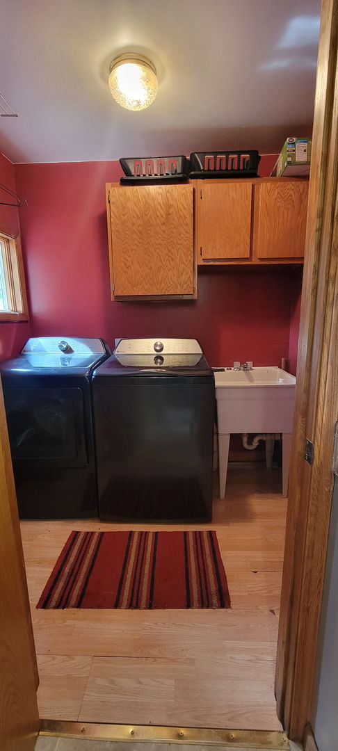 382 Keigwin Road Walnut, IL 61376 - Photo 21 of 49 a kitchen with a sink and a microwave
