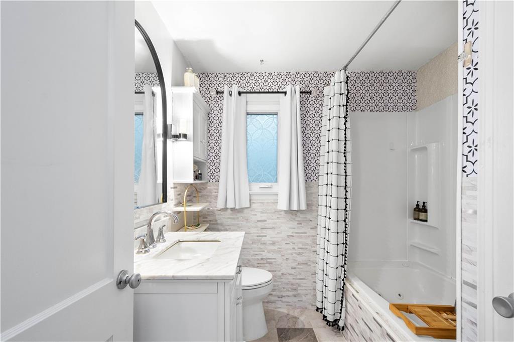 112 Locust Lane Pittsburgh, PA 15241 - Photo 16 of 38 a bathroom with a sink toilet and shower