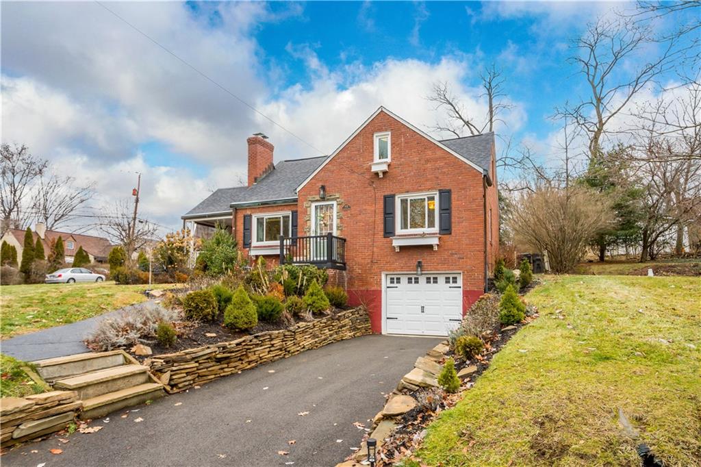 112 Locust Lane Pittsburgh, PA 15241 - Photo 2 of 38 a front view of a house with garden