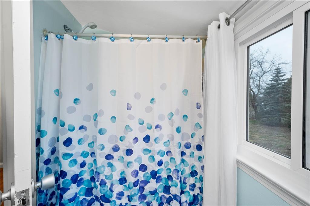 112 Locust Lane Pittsburgh, PA 15241 - Photo 23 of 38 a bathroom with a shower curtain