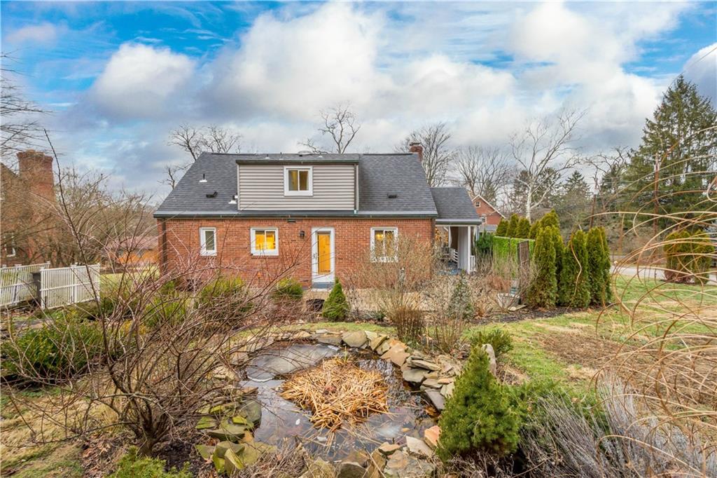 112 Locust Lane Pittsburgh, PA 15241 - Photo 31 of 38 a front view of a house with a yard