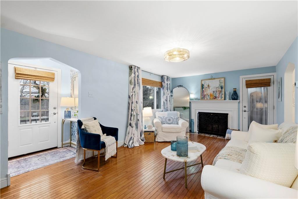 112 Locust Lane Pittsburgh, PA 15241 - Photo 5 of 38 a living room with furniture a fireplace and a table