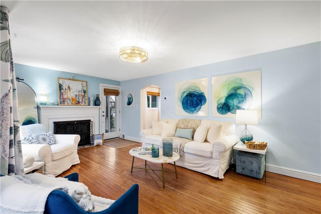 112 Locust Lane Pittsburgh, PA 15241 - Photo 6 of 38 a living room with furniture and a fireplace