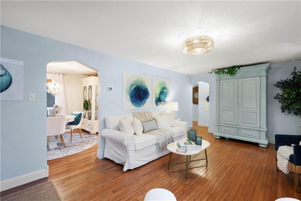 112 Locust Lane Pittsburgh, PA 15241 - Photo 7 of 38 a living room with furniture or wooden floor and a large window