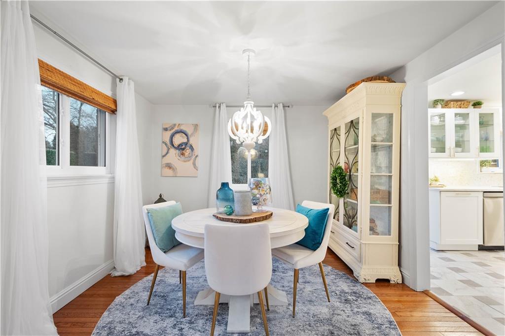 112 Locust Lane Pittsburgh, PA 15241 - Photo 8 of 38 a dining room with furniture a chandelier and wooden floor