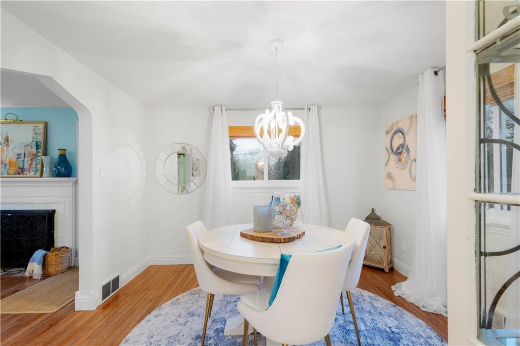 112 Locust Lane Pittsburgh, PA 15241 - Photo 9 of 38 a dining room with furniture a rug and wooden floor