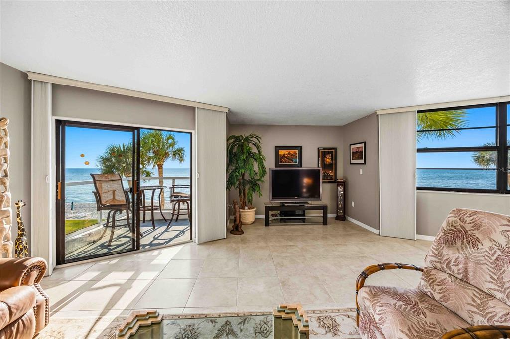 1050 Longboat Club Road, Unit 301 Longboat Key, FL 34228 - Photo 15 of 57 a bedroom with furniture and a window