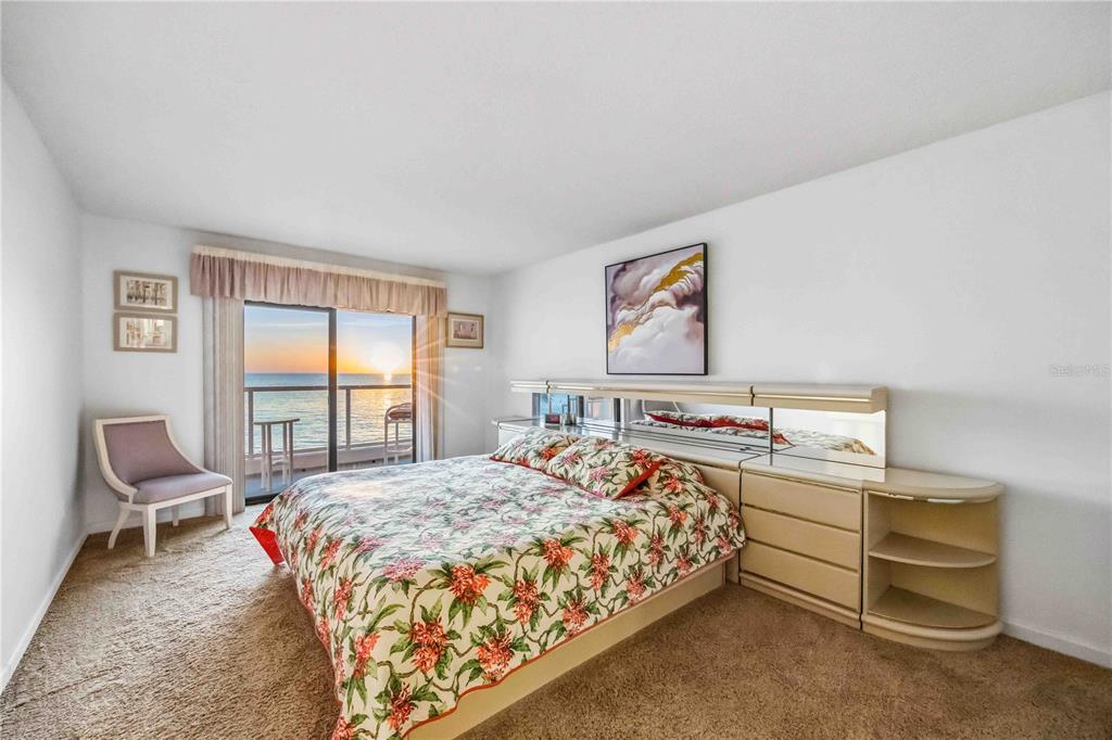 1050 Longboat Club Road, Unit 301 Longboat Key, FL 34228 - Photo 30 of 57 a bedroom with a bed and a window